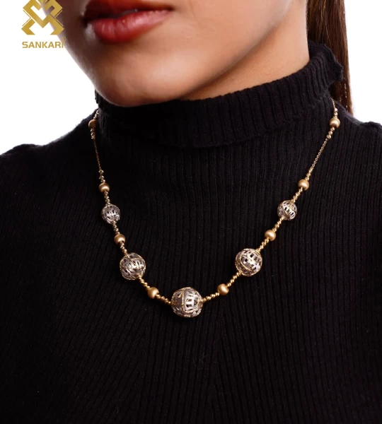 Opulent Charm: Luxurious 18k Gold Set with Intricate Ball Design